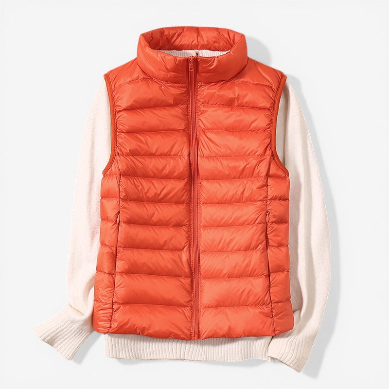 Sleeveless zip vest with high neck collar