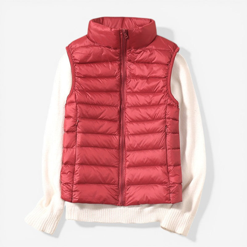 Sleeveless zip vest with high neck collar
