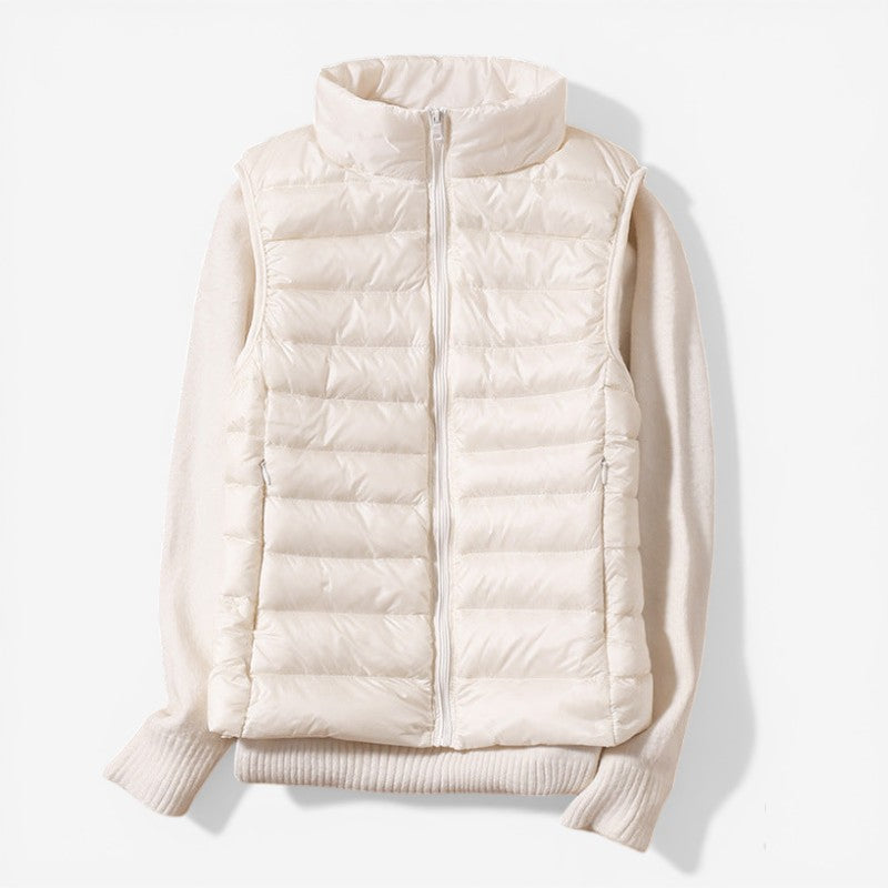 Sleeveless zip vest with high neck collar