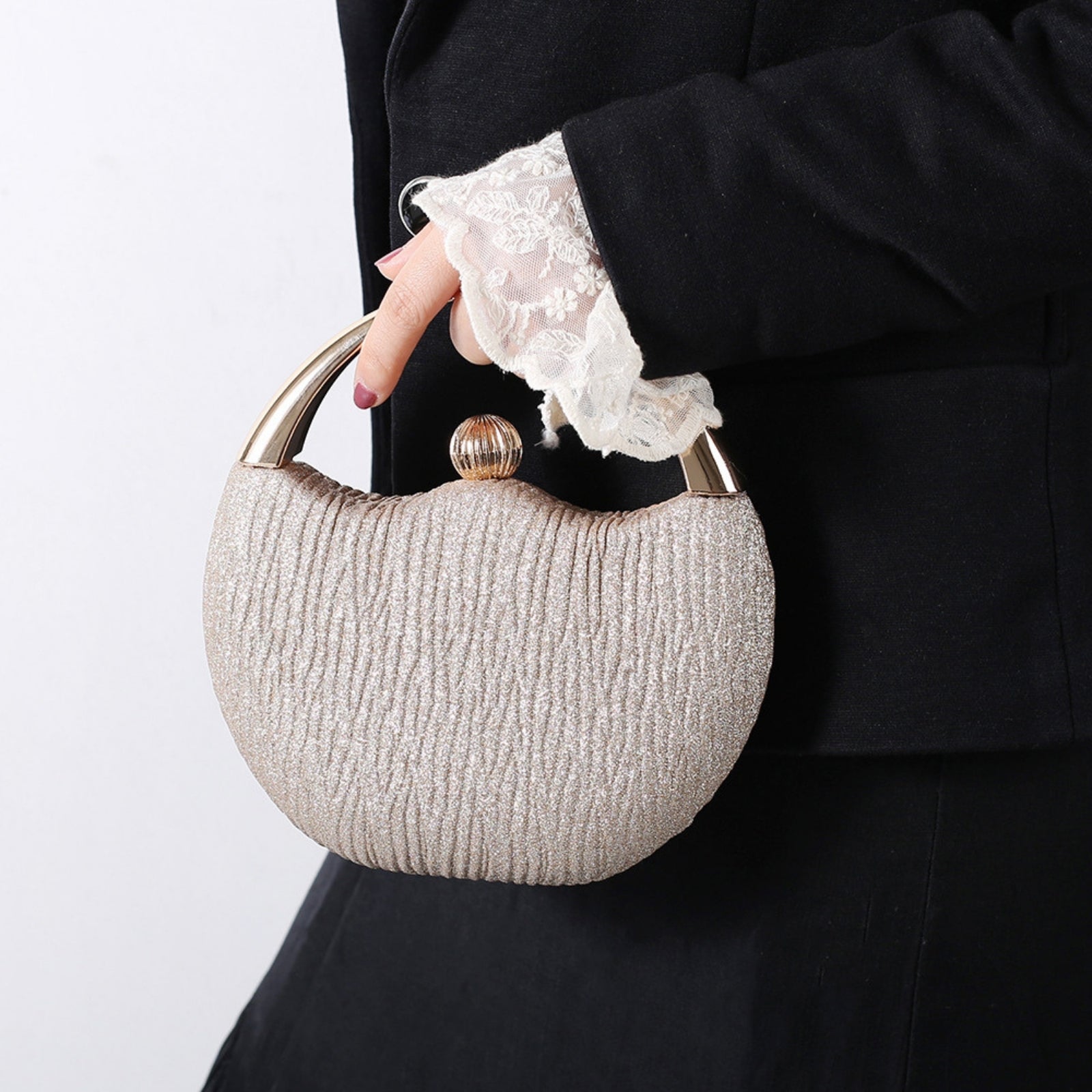 Lily – Shiny handle clutch bag with chic design