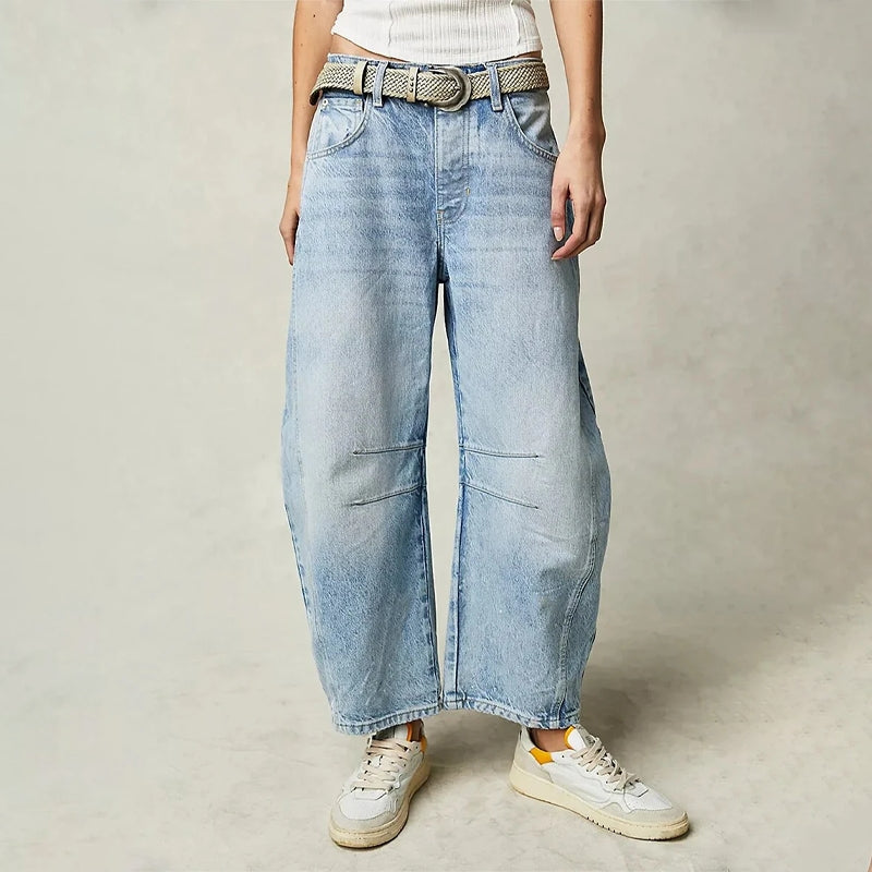 Pantaloni in denim a gamba larga alla caviglia con chiusura a zip