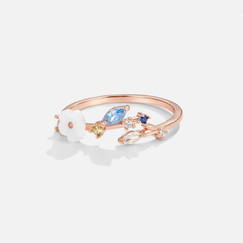 Liora – Modern whimsical ring with leaf-inspired gemstone accents and artistic open design