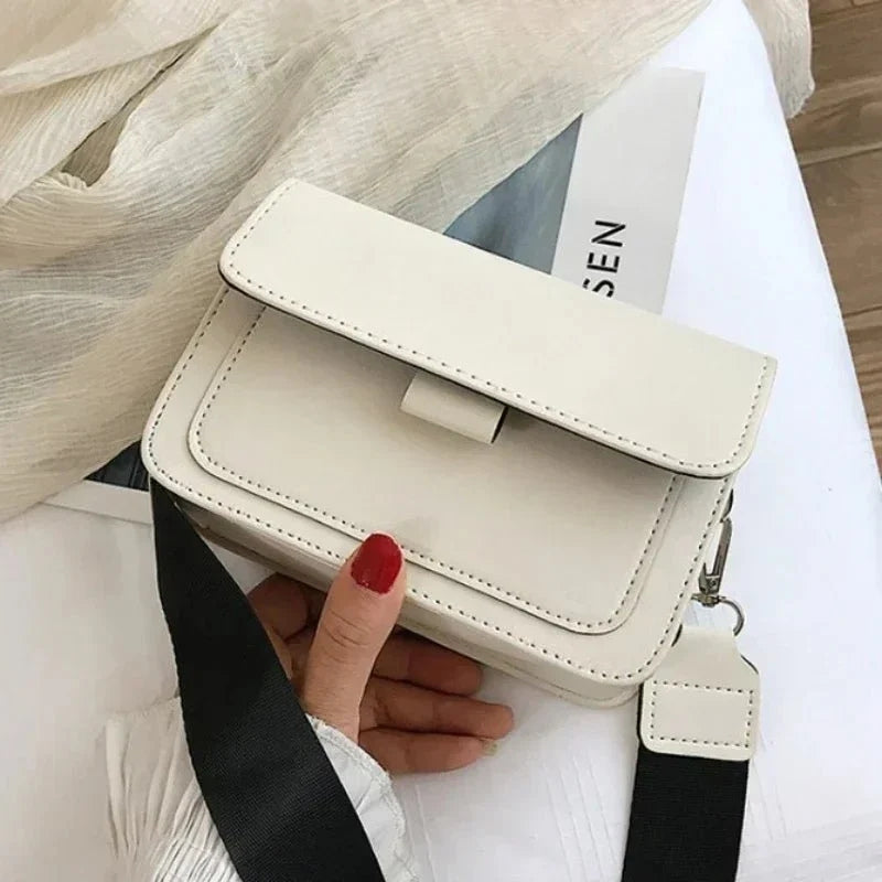 Leony - Sac bandoulière à rabat élégant avec fermeture sécurisée et design compact