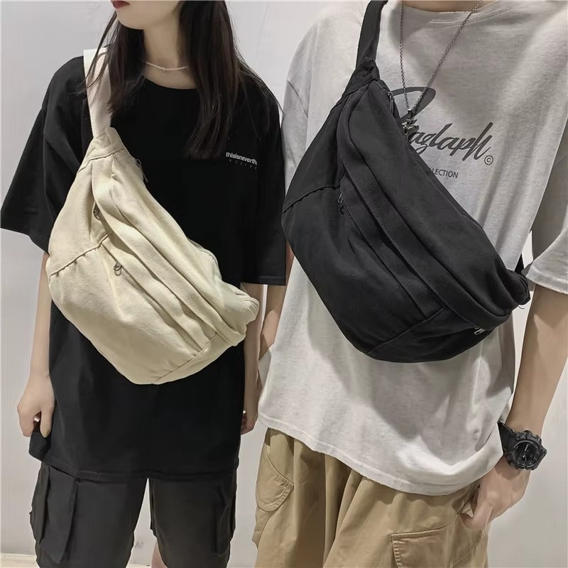 FlexCarry – Torebka crossbody z regulowanym paskiem i kieszeniami na zamek