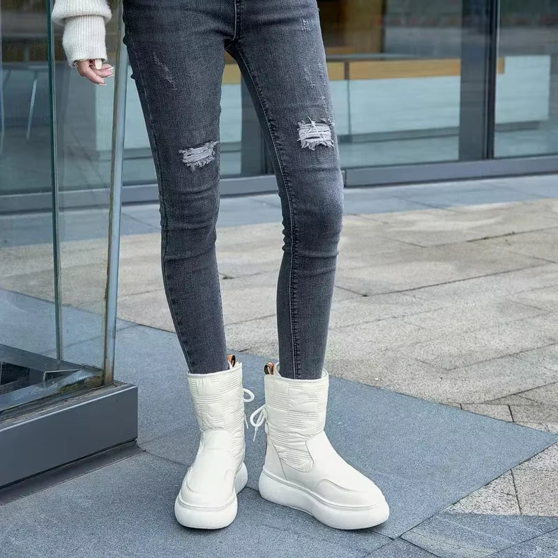 Trudy - Round toe boots with lace-up closure