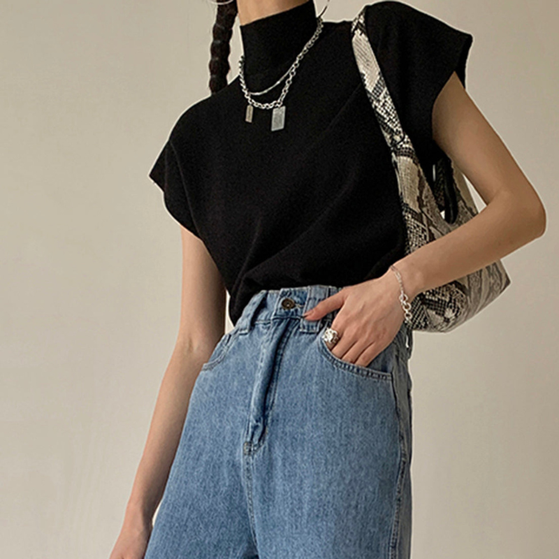 Blusa a coste da donna con collo alto