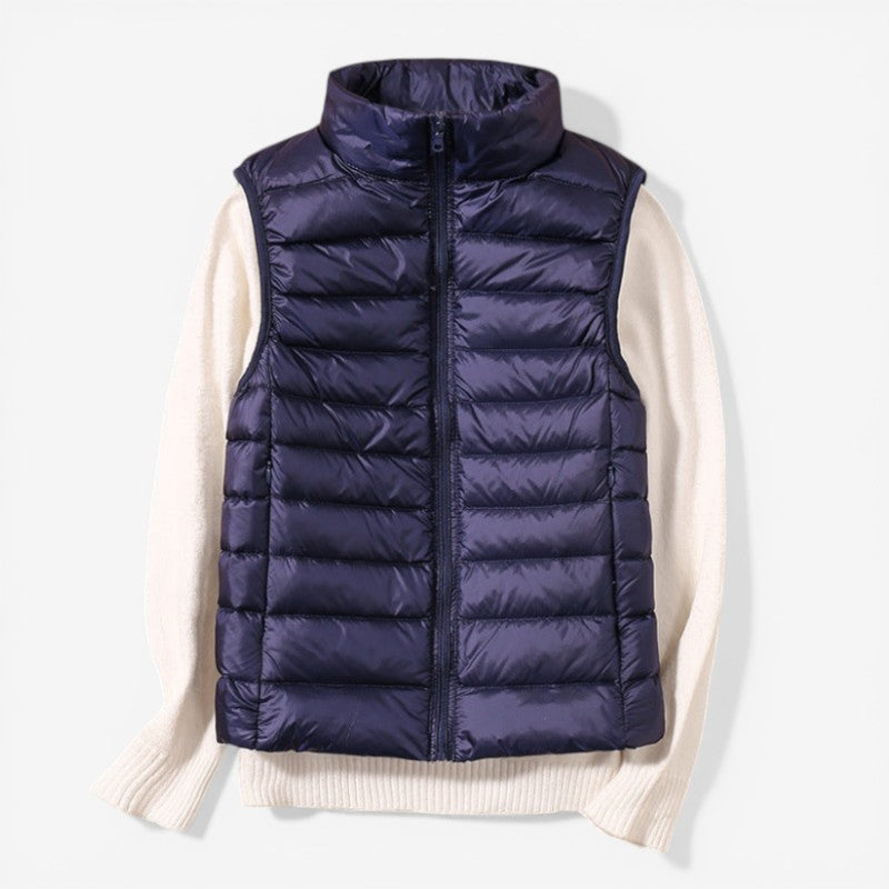 Sleeveless zip vest with high neck collar