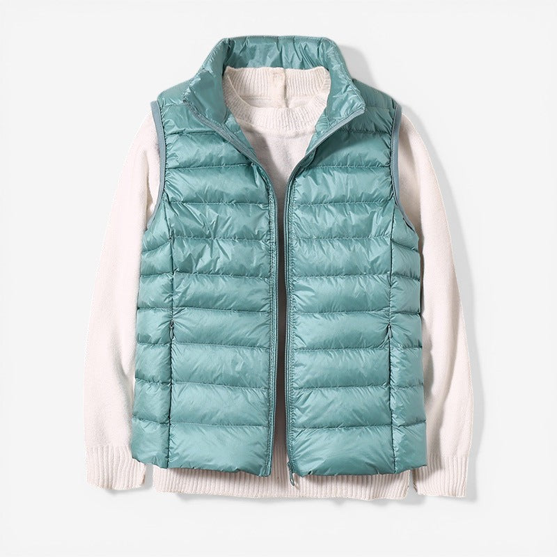 Sleeveless zip vest with high neck collar