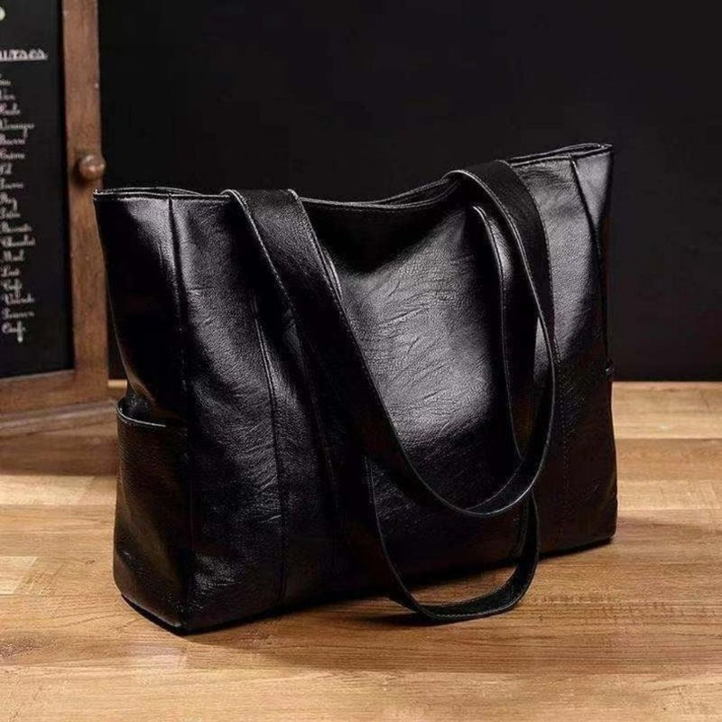 Sienna - Sac à bandoulière avec large sangle et grande capacité | Compartiment principal spacieux pour le transport quotidien | Taille standard | Noir, Marron