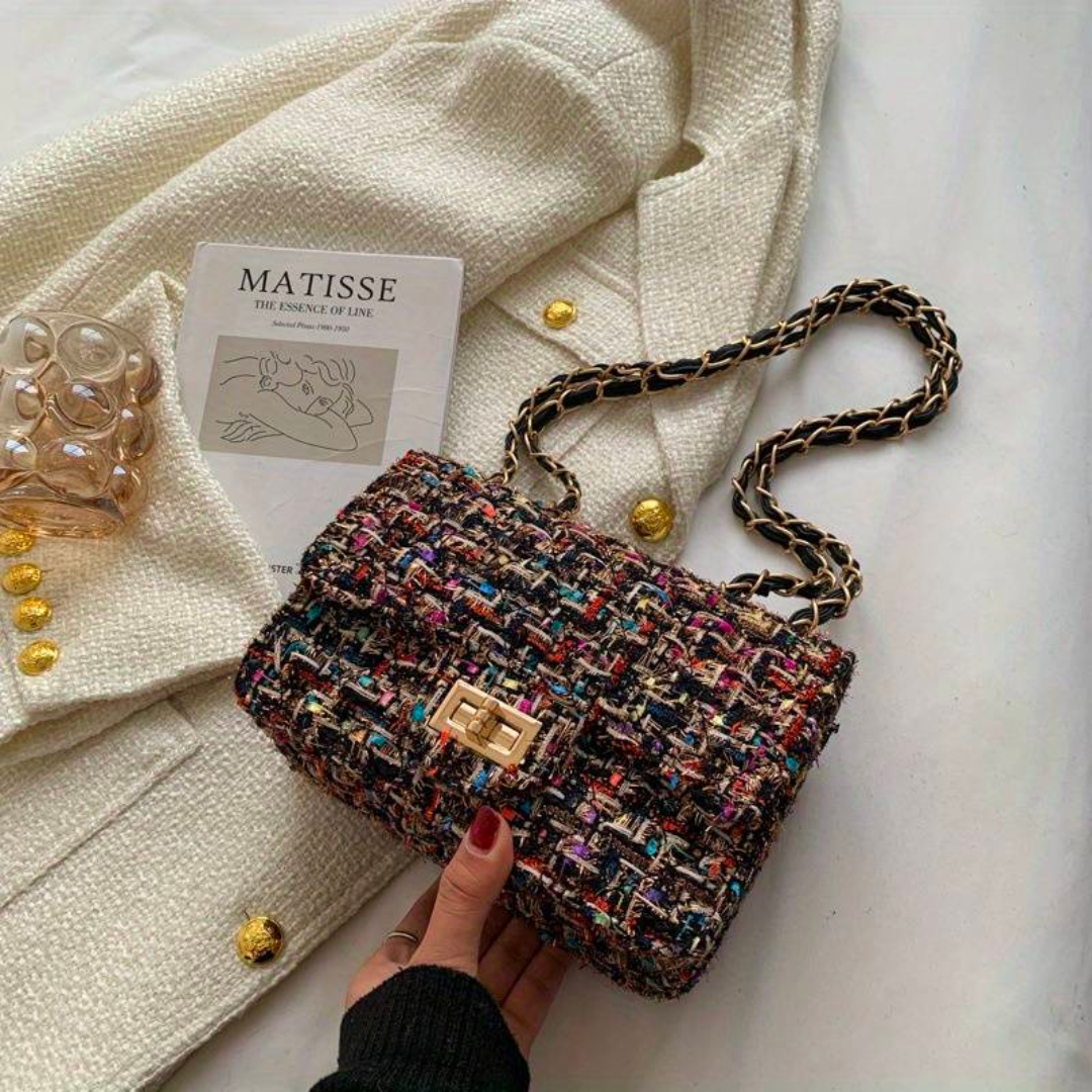 Tricia – Structured shoulder bag with elegant silhouette and timeless charm
