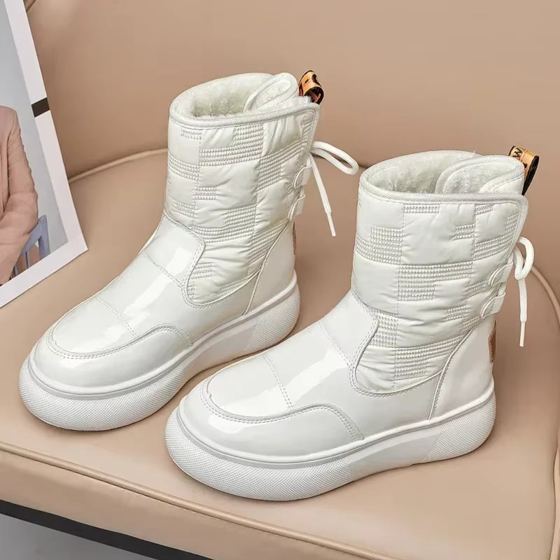 Trudy - Round toe boots with lace-up closure