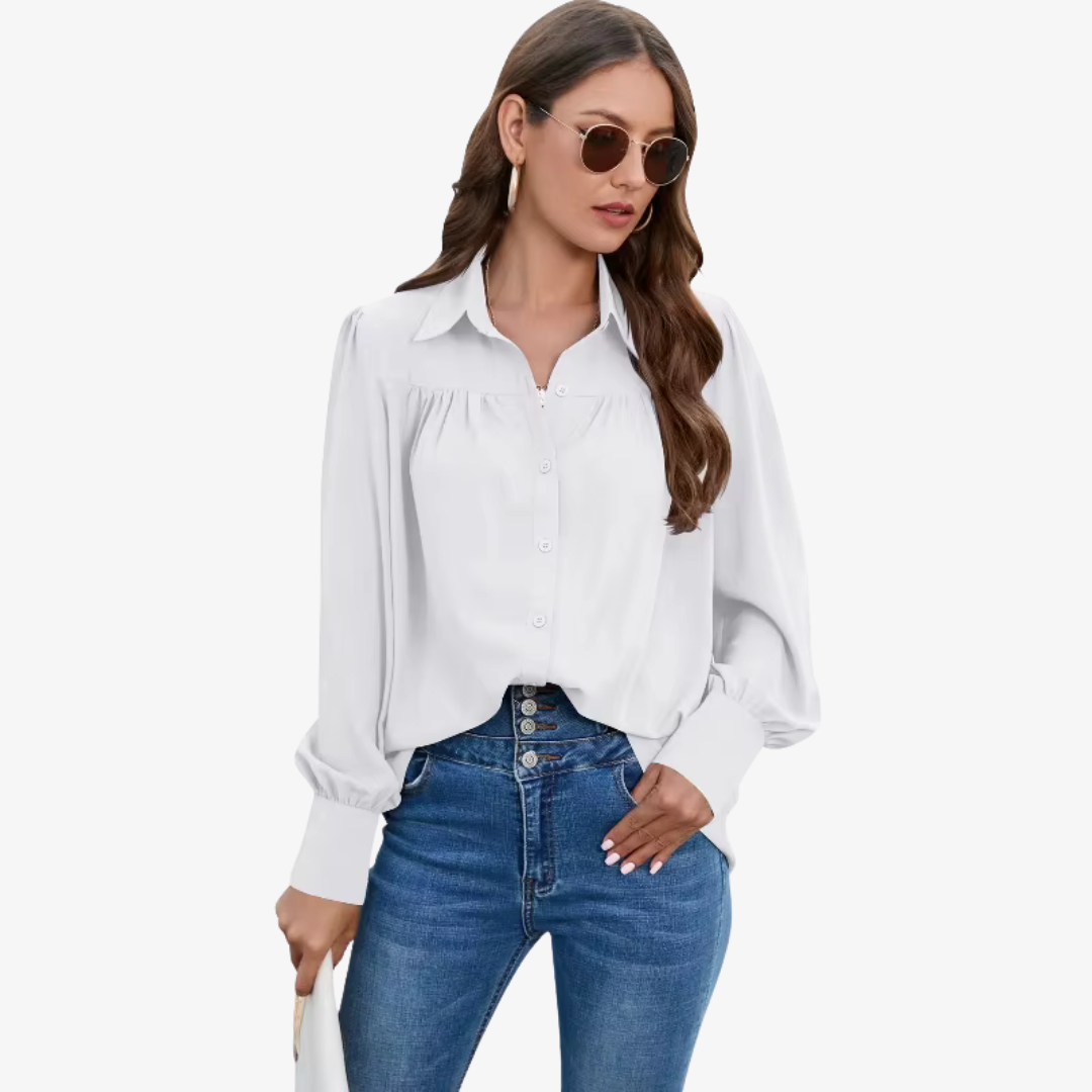 Ava – Luźna bluzka z bufiastymi rękawami i eleganckimi detalami