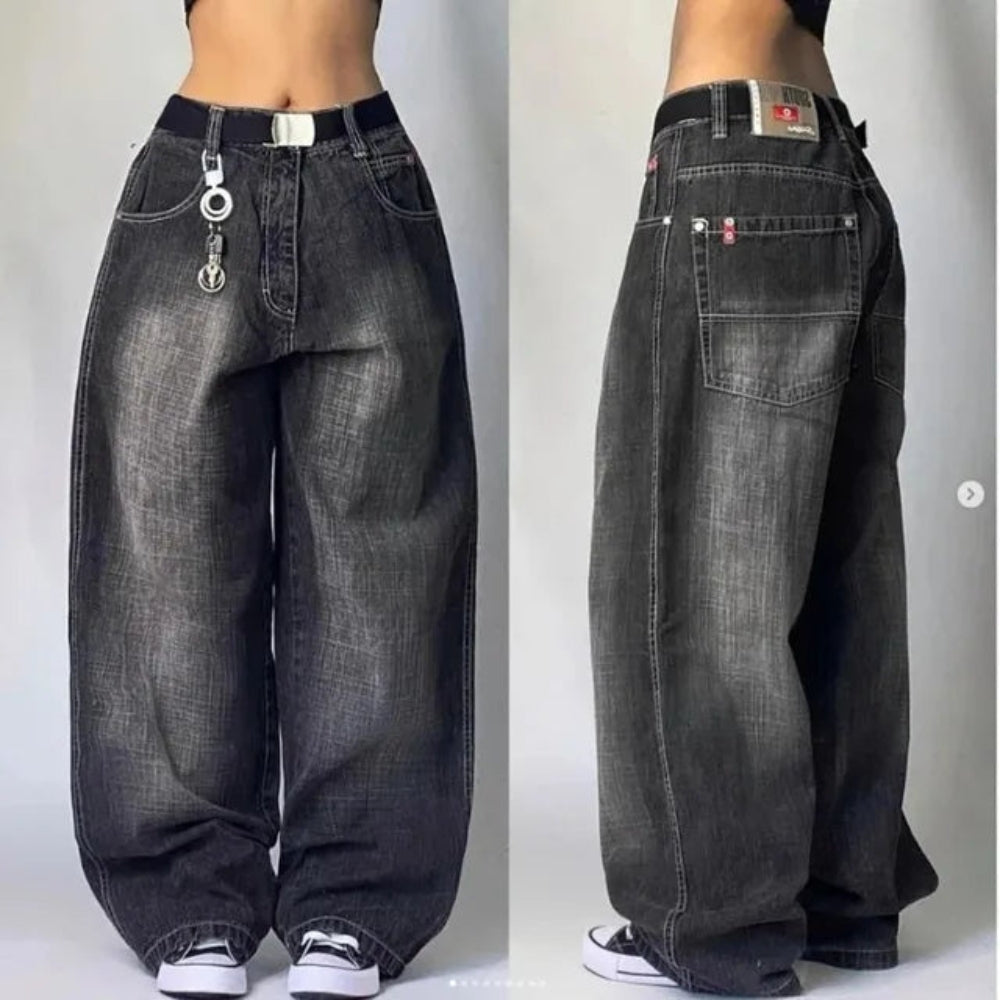 Amara – Elegant loose pants with functional pockets and high waistband