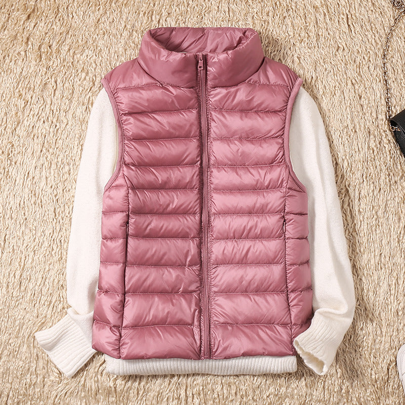 Sleeveless zip vest with high neck collar