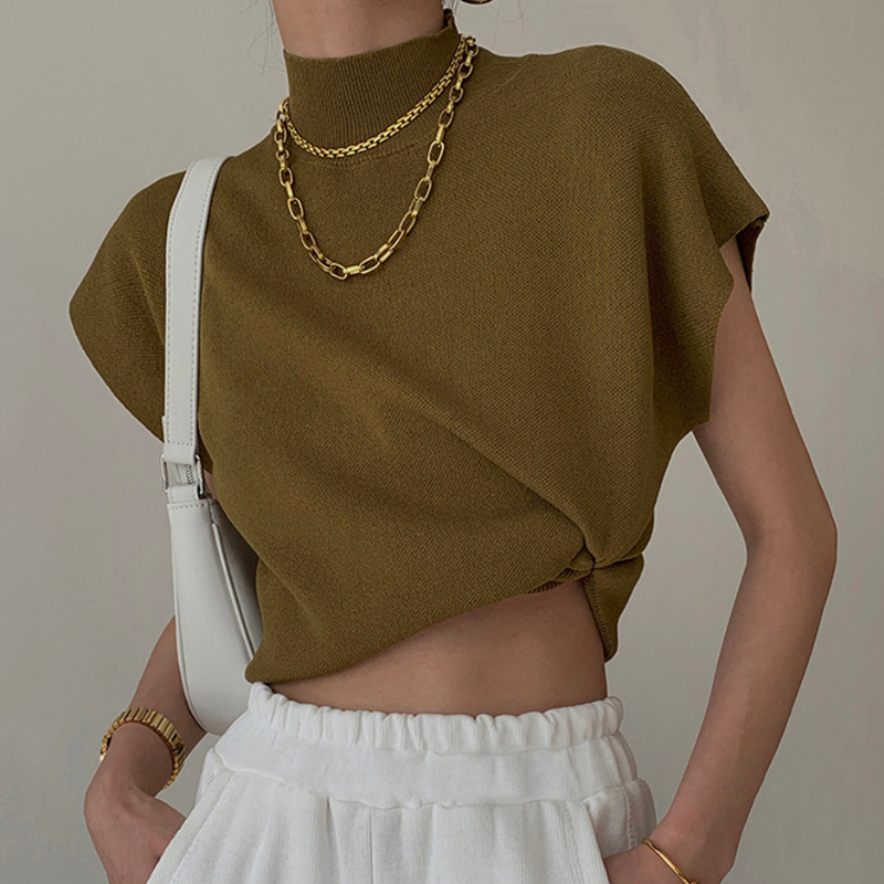 Blusa a coste da donna con collo alto