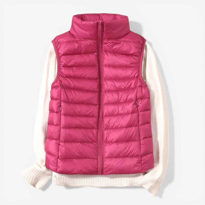 Sleeveless zip vest with high neck collar