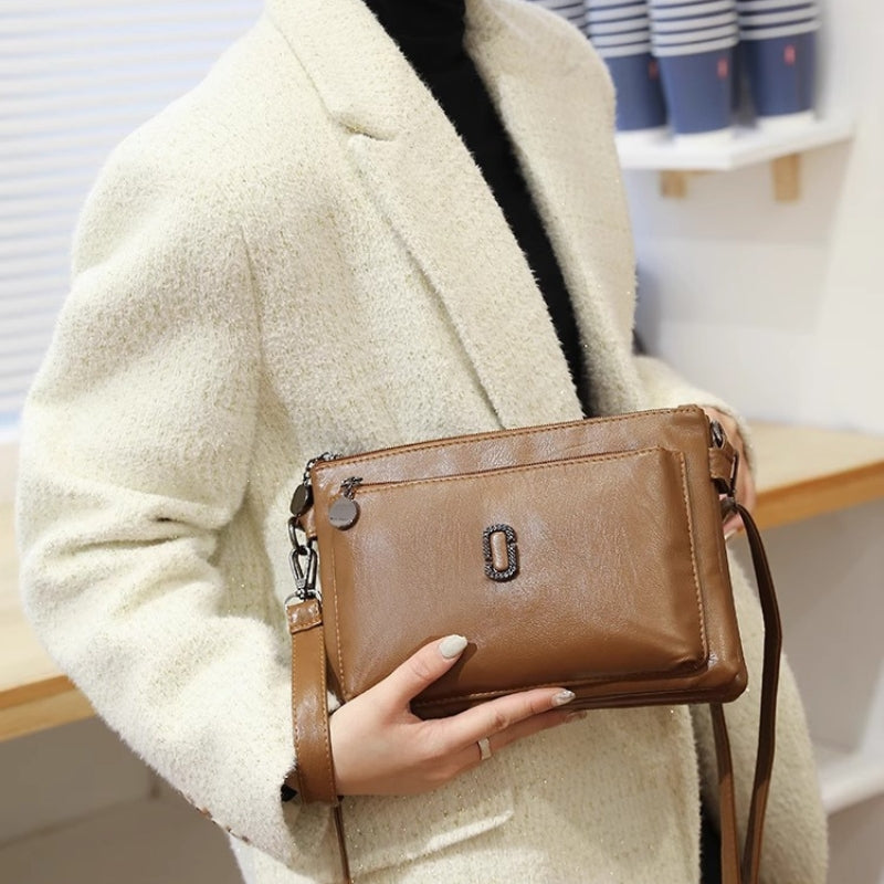 Delilah - Piccola Borsa a Tracolla con Tasche con Zip e Tracolla Regolabile