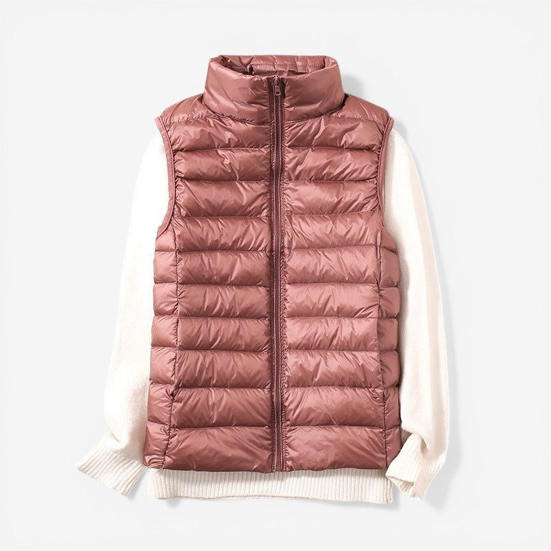 Sleeveless zip vest with high neck collar