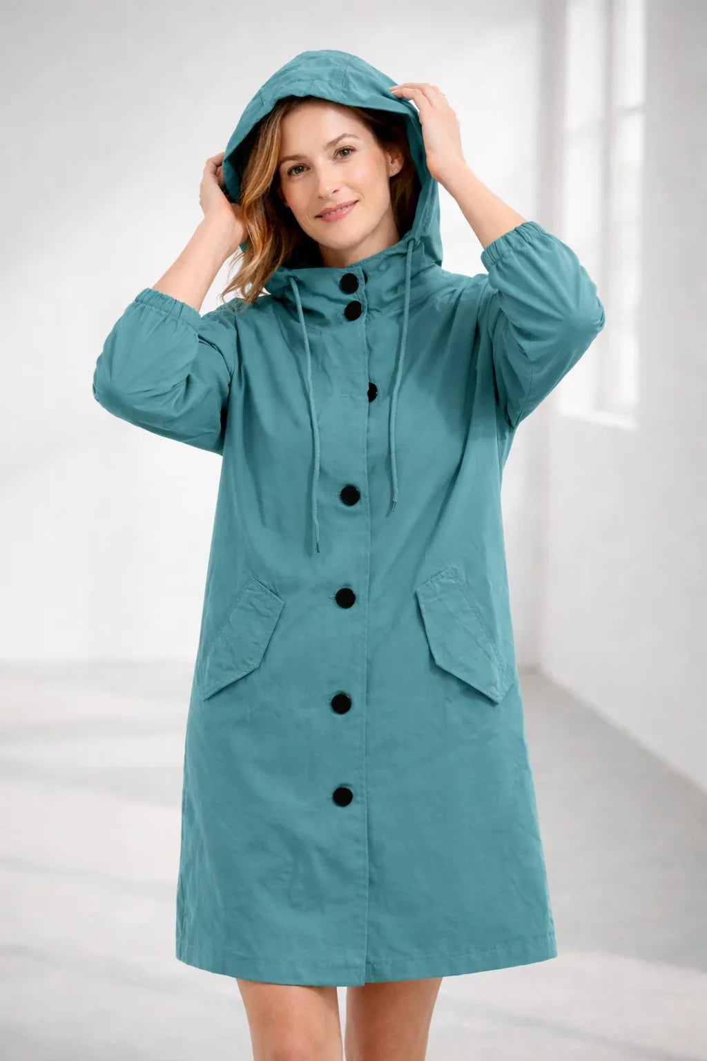Qelviora – Mid-Length Hooded Jacket with Button Placket