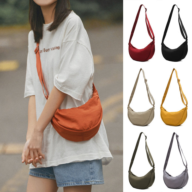 Yola - Sac en forme de demi-lune avec artisanat élégant et rangements intelligents