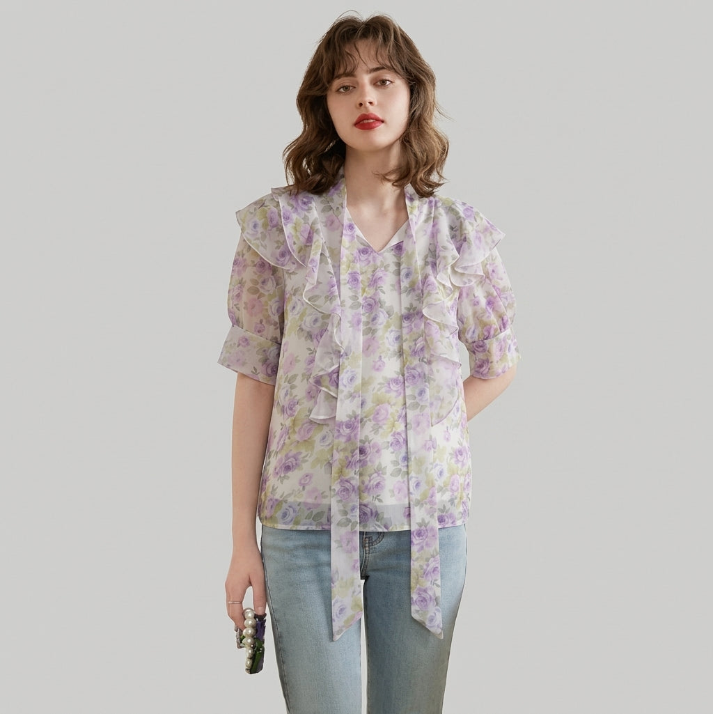 Emily – Blusa floreale a maniche corte con fiocco e dettagli in perle