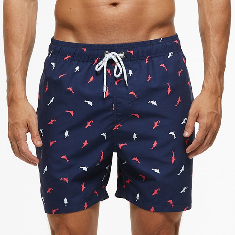 Nico – Costume da bagno elegante con tasche pratiche e motivi stampati