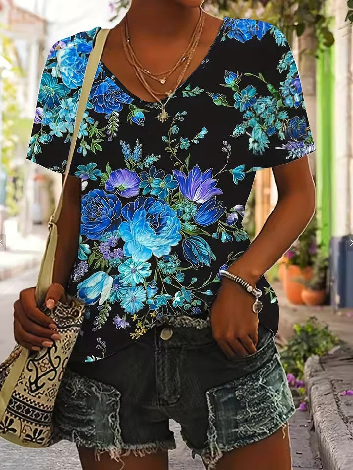 Zyra - Stylish V-neck T-shirt with bold artistic prints and vibrant patterns