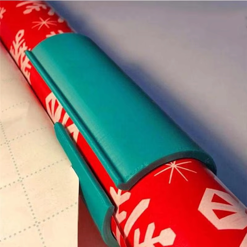WrapSlice – cortador de papel de regalo con cuchilla integrada y bisagra flexible para sujetar el papel