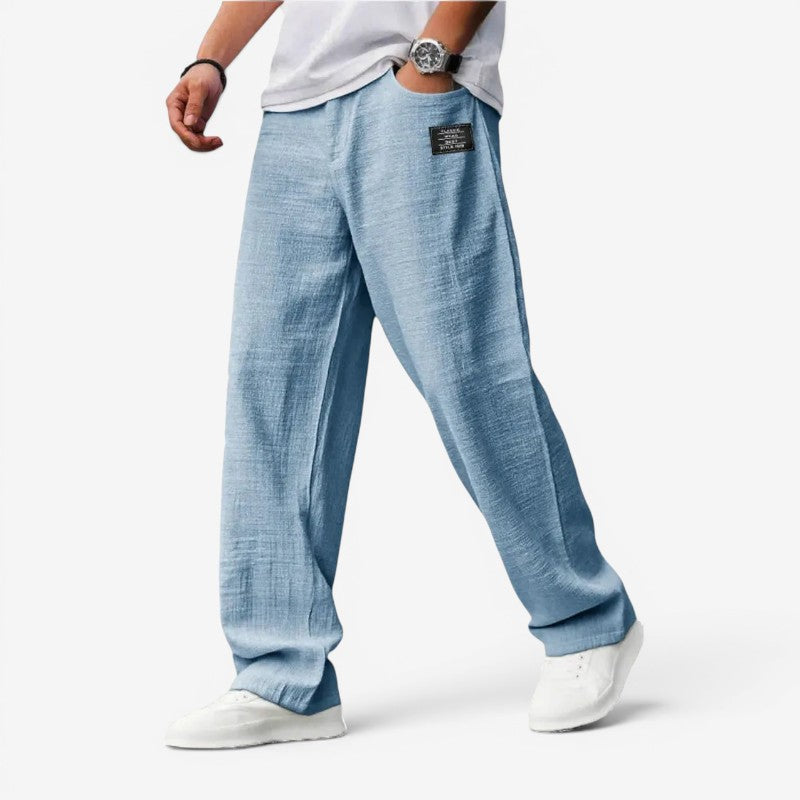 Pantaloni bărbătești cu croială largă și buzunare laterale