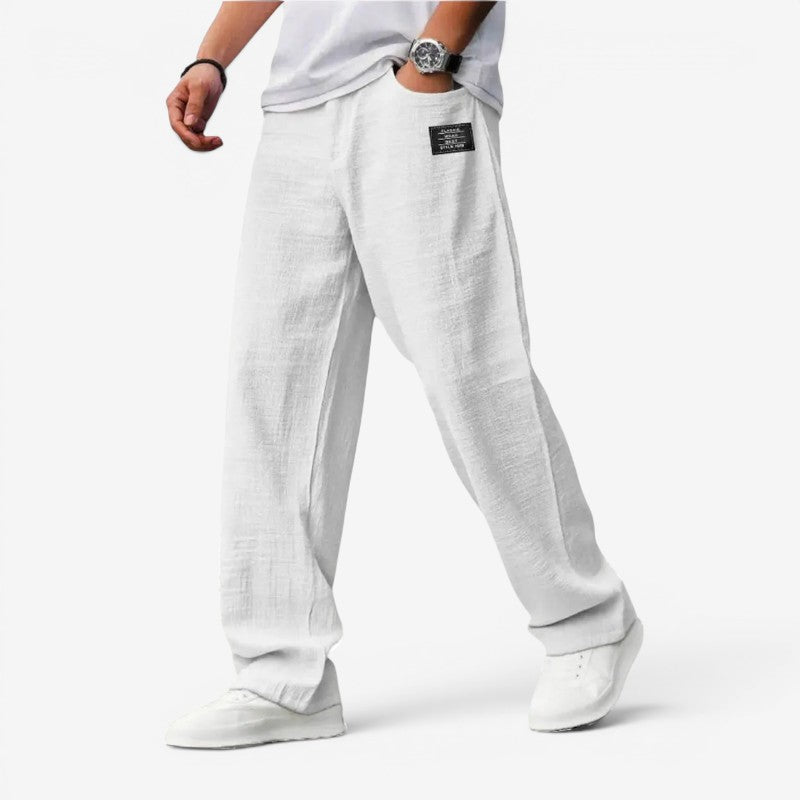 Pantaloni bărbătești cu croială largă și buzunare laterale