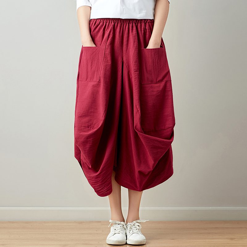 Mira – Pantaloni relaxați drapați cu buzunare practice și siluetă fluidă