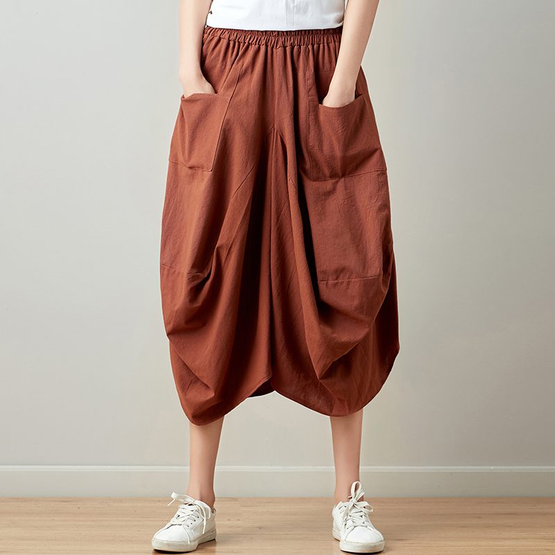 Mira – Pantaloni relaxați drapați cu buzunare practice și siluetă fluidă