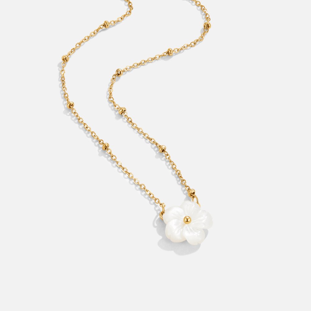Isla – Collier pendentif floral avec breloque circulaire et chaîne délicatement superposée