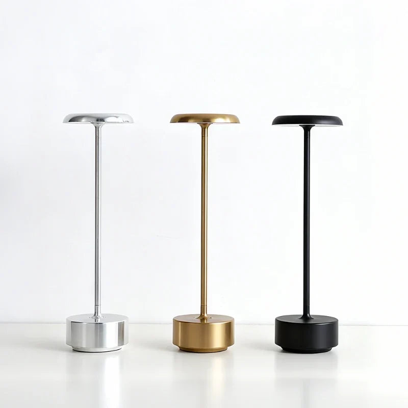 DiscLume - Lampada da tavolo in alluminio con testa a forma di disco