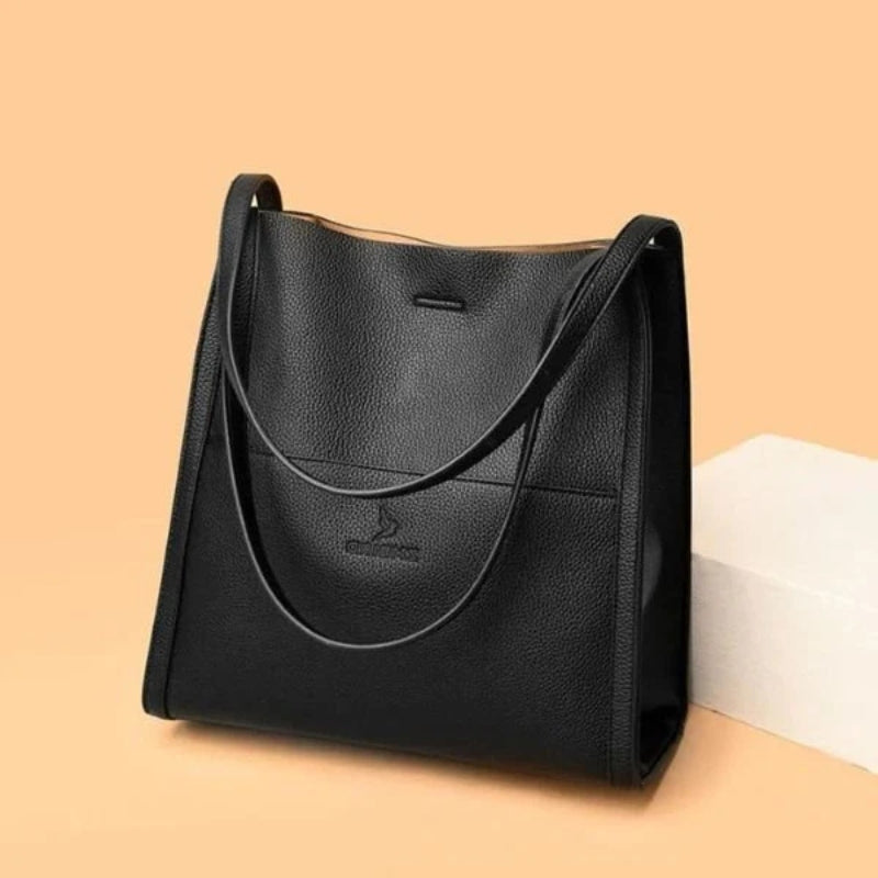 Maya – Sac bandoulière structuré avec silhouette épurée et espace de rangement sécurisé