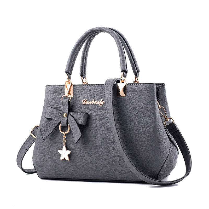 UrbanCharm - Elegante grande borsa a spalla con dettaglio a stella e tasche multiple