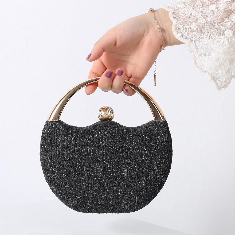 Lily – Shiny handle clutch bag with chic design