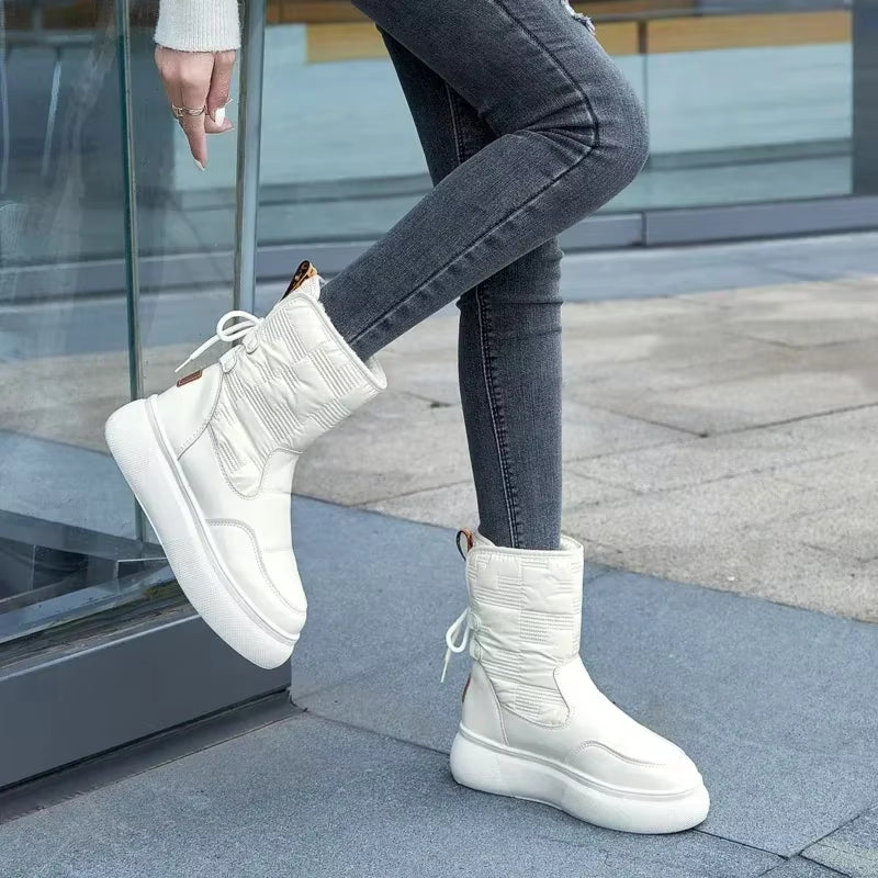 Trudy - Round toe boots with lace-up closure