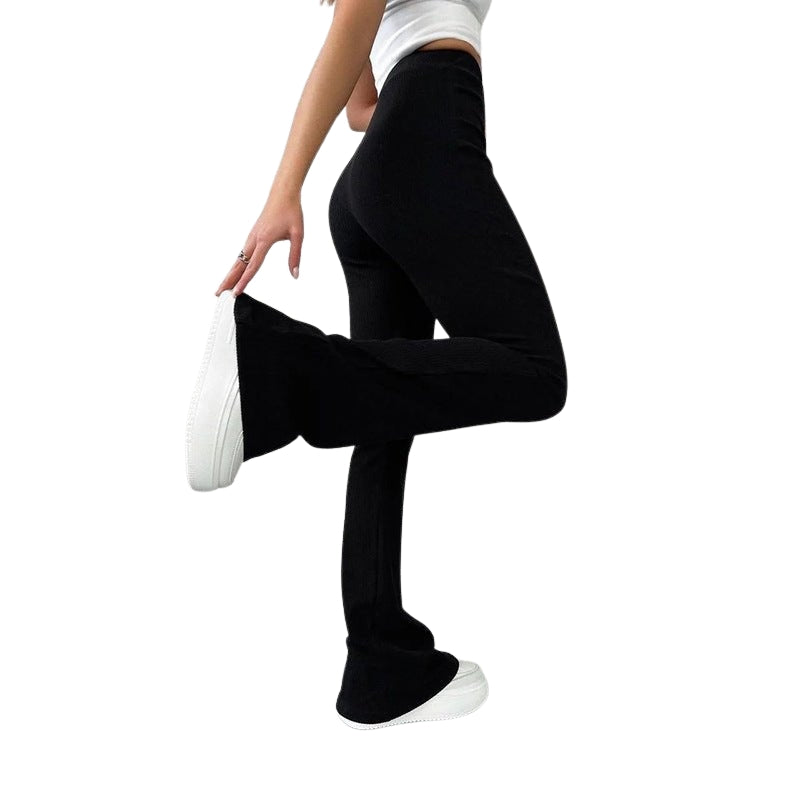 Clara – Pantaloni evazați cu talie înaltă și detalii rib