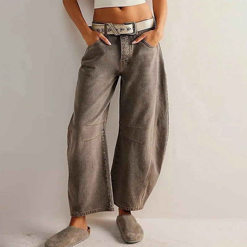 Pantaloni in denim a gamba larga alla caviglia con chiusura a zip