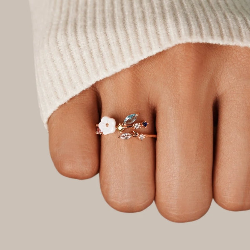 Liora – Modern whimsical ring with leaf-inspired gemstone accents and artistic open design