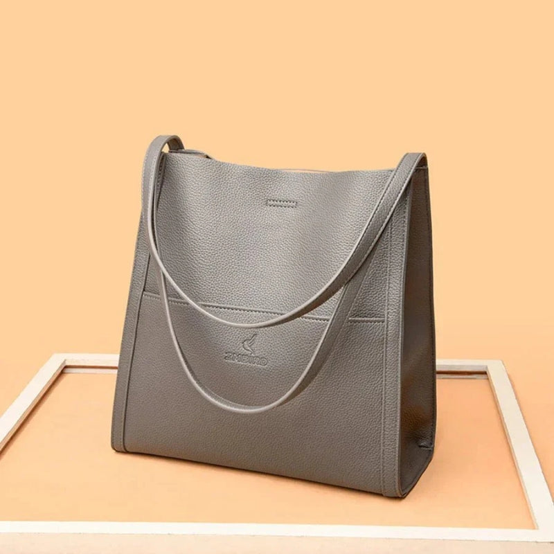 Maya – Sac bandoulière structuré avec silhouette épurée et espace de rangement sécurisé