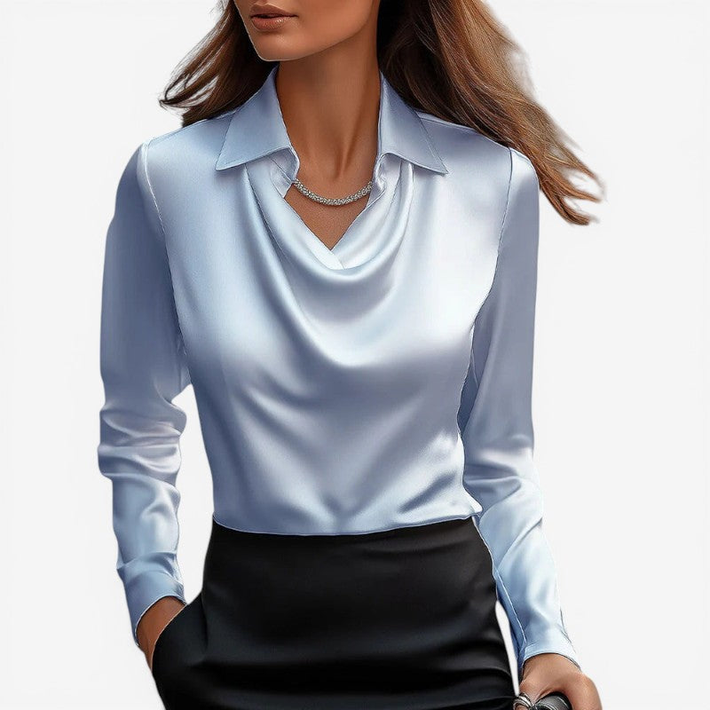 Blusa da donna aderente con collo alto e design sartoriale