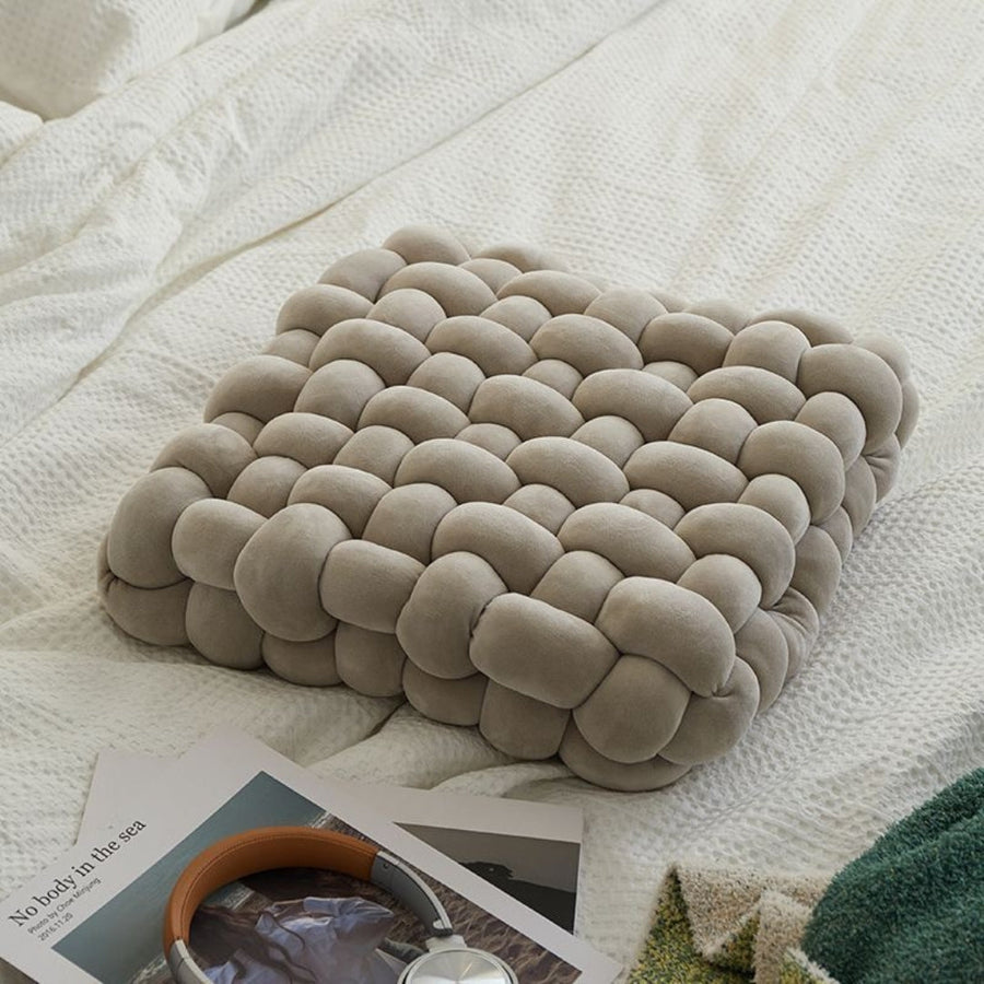 KnotEase - Coussin noué élégant tissé pour un confort ultime
