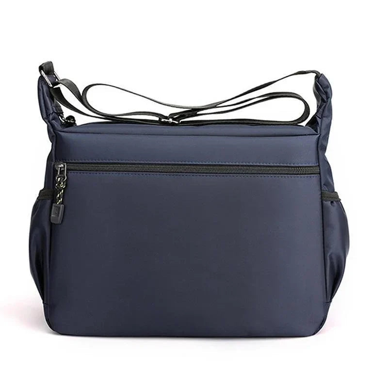 Clara – Water-Repellent Compact Shoulder Bag with Adjustable Strap and Zipper