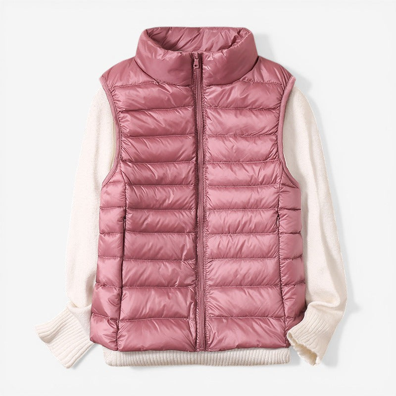 Sleeveless zip vest with high neck collar