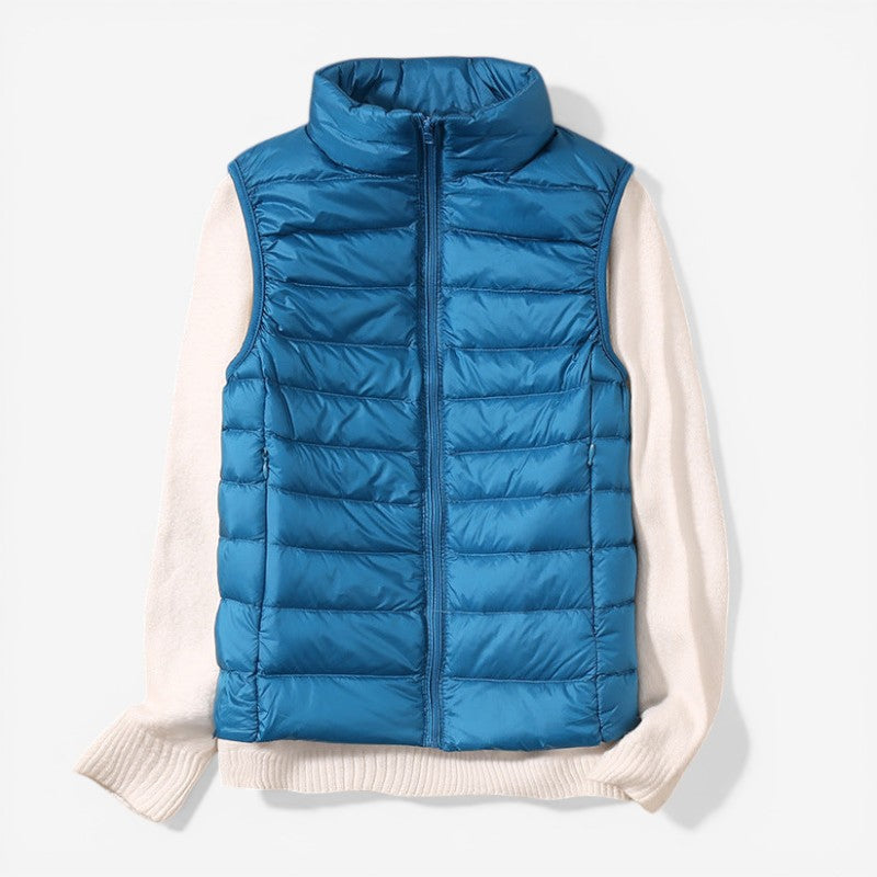Sleeveless zip vest with high neck collar