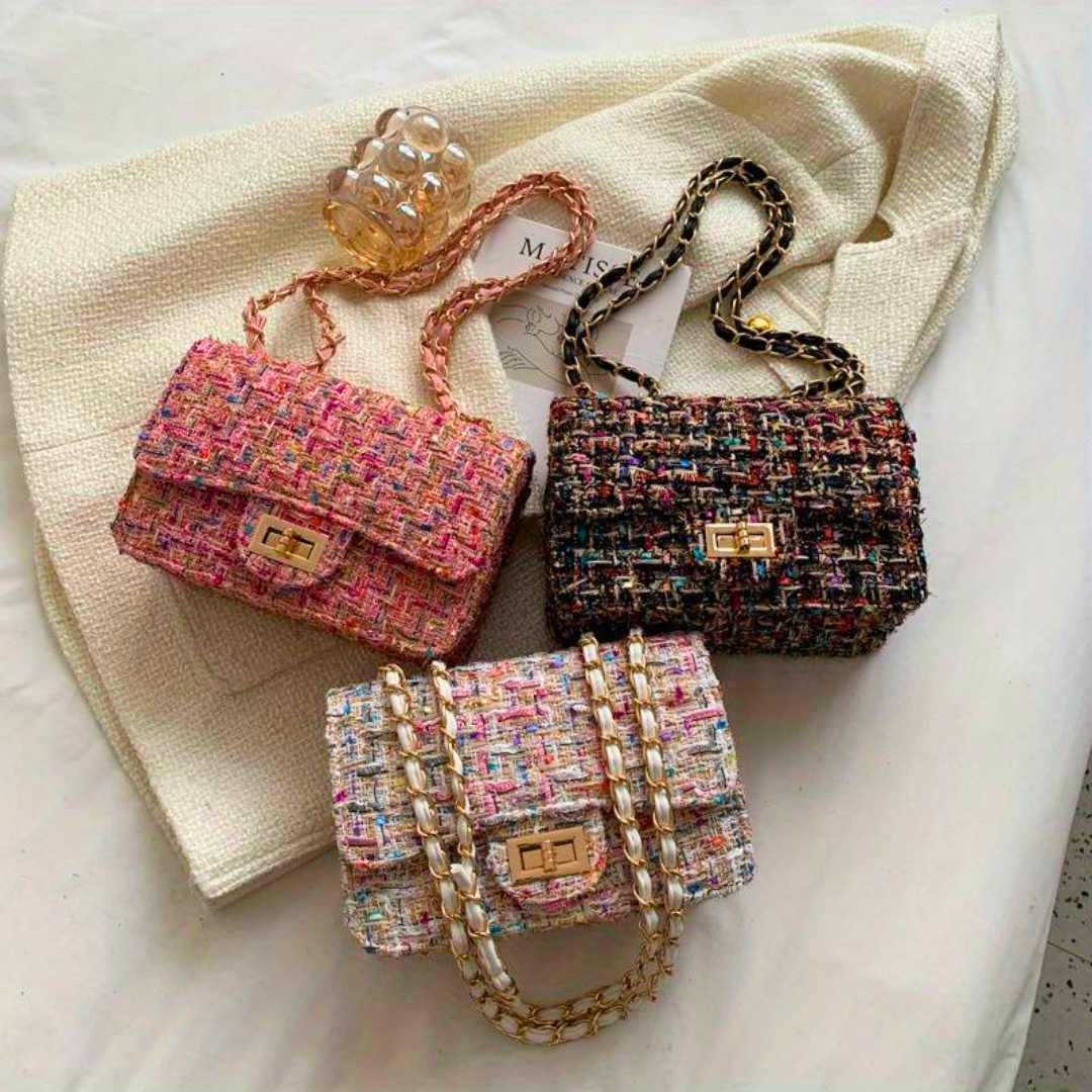 Tricia – Structured shoulder bag with elegant silhouette and timeless charm