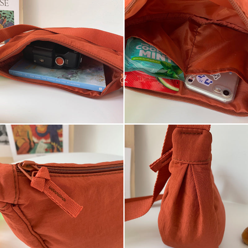 Yola - Sac en forme de demi-lune avec artisanat élégant et rangements intelligents