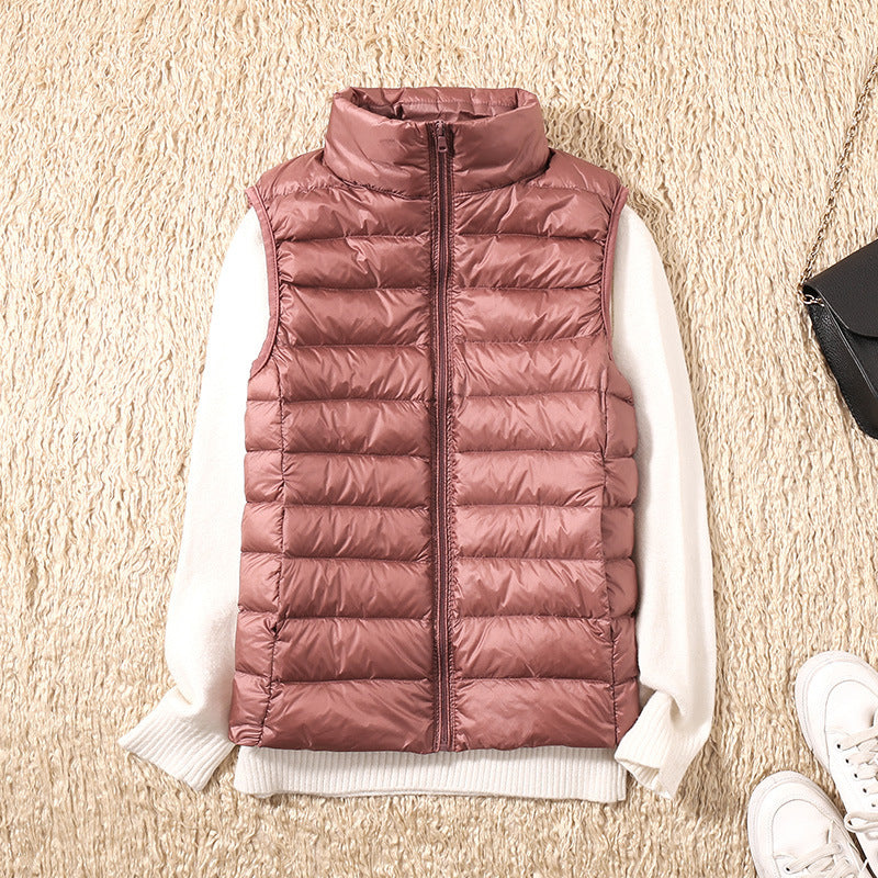 Sleeveless zip vest with high neck collar